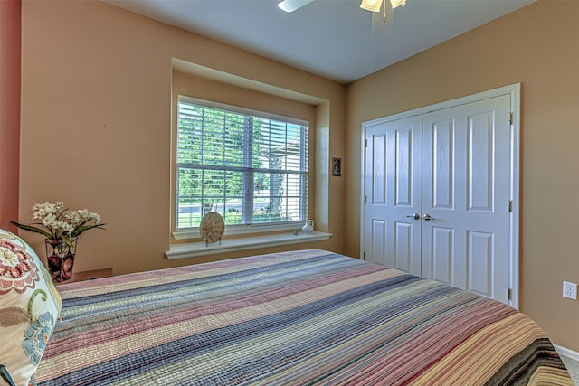 bedroom with a closet and ceiling fan