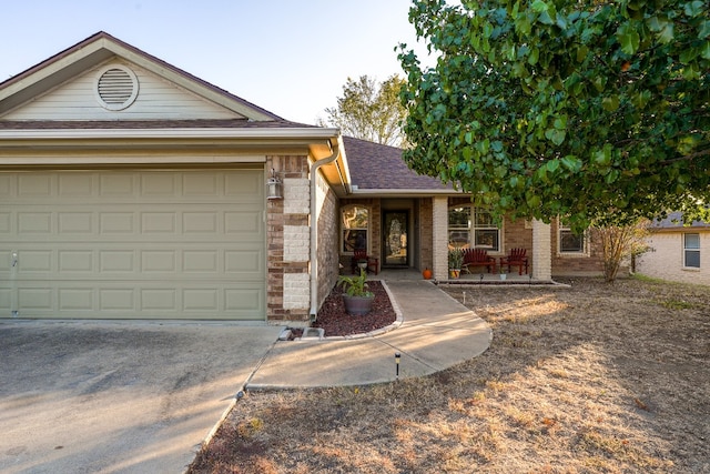 view of front of property featuring a garage