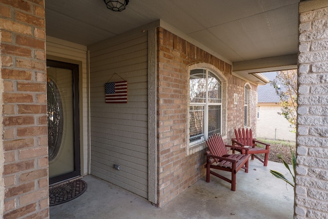 doorway to property with a porch