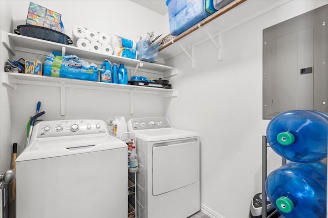 laundry room featuring independent washer and dryer and electric panel