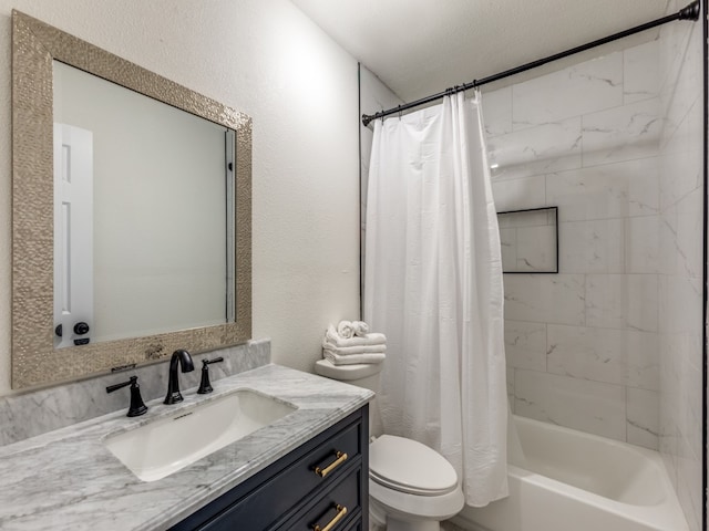 full bathroom with toilet, a textured ceiling, vanity, and shower / tub combo with curtain