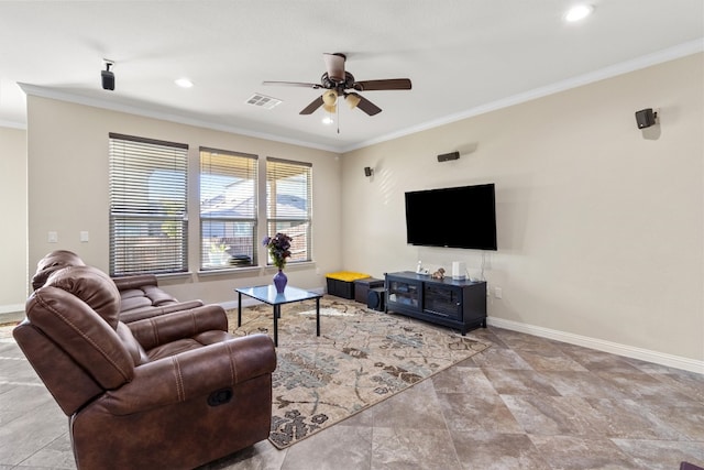 living room with ceiling fan and ornamental molding