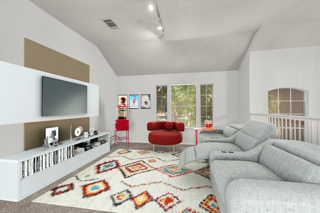 living room with rail lighting, lofted ceiling, and carpet flooring