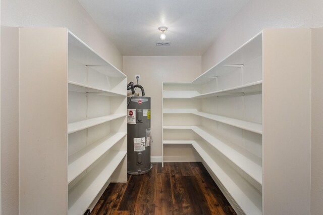 pantry featuring electric water heater