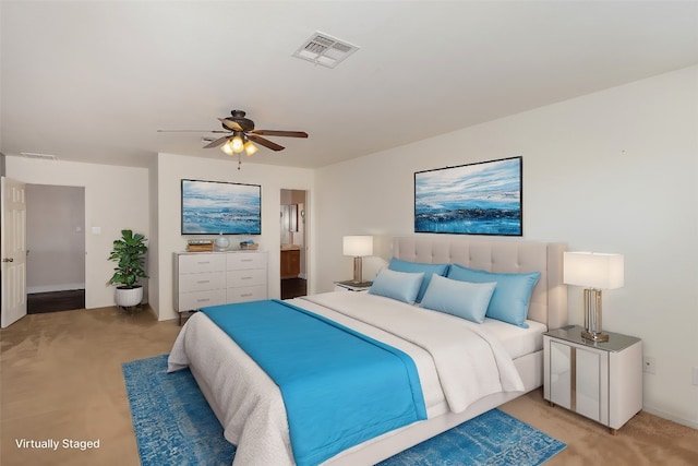 bedroom featuring ceiling fan and carpet floors