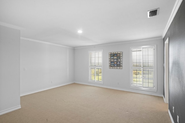 empty room with light carpet and ornamental molding