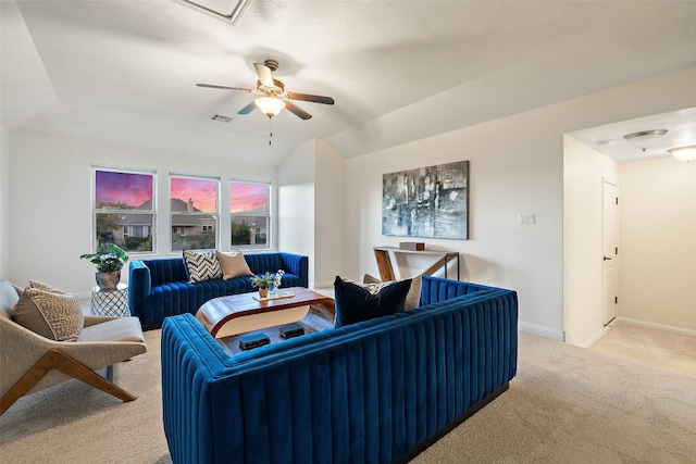 living room featuring light colored carpet and ceiling fan