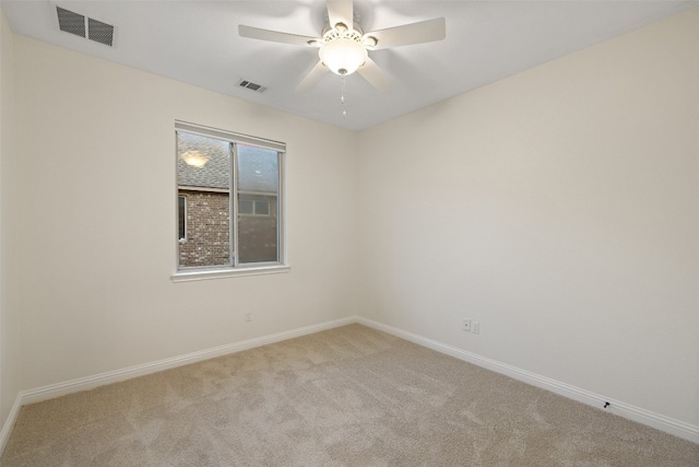 unfurnished room with carpet floors and ceiling fan