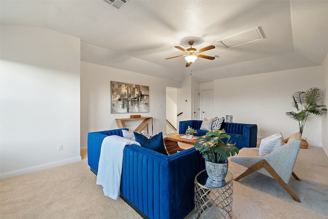 living room with carpet and ceiling fan