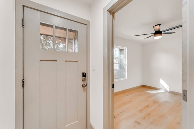 entrance foyer featuring ceiling fan and light hardwood / wood-style floors