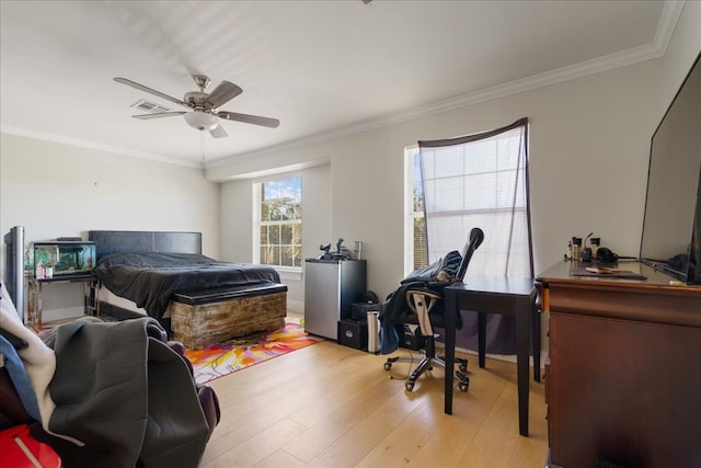 bedroom with ceiling fan, light hardwood / wood-style flooring, and ornamental molding