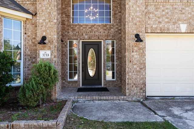 property entrance featuring a garage