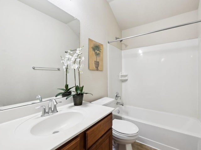 full bathroom with vanity, shower / bath combination, and toilet