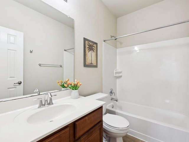 full bathroom with vanity,  shower combination, and toilet