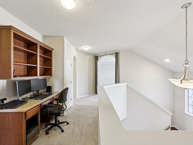 home office featuring light colored carpet and lofted ceiling