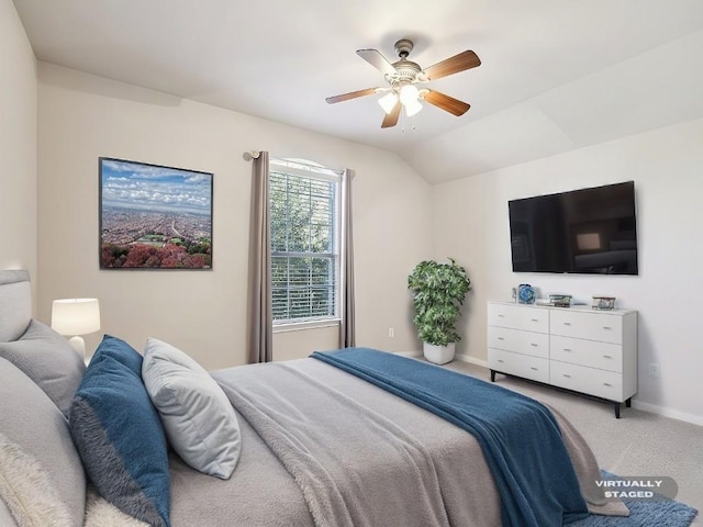 bedroom featuring carpet flooring, ceiling fan, and lofted ceiling