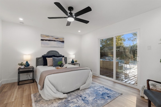 bedroom featuring ceiling fan, access to exterior, and light wood-type flooring