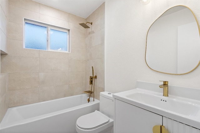 full bathroom featuring vanity, toilet, and tiled shower / bath