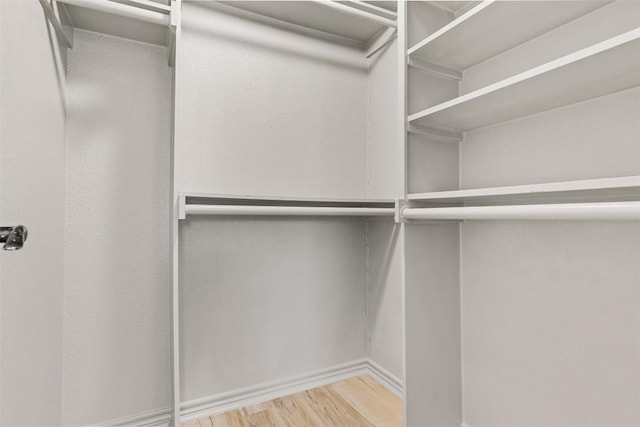 6700 Cooper Ln Unit 9, Austin, TX 78745 - spacious closet featuring wood finished floors