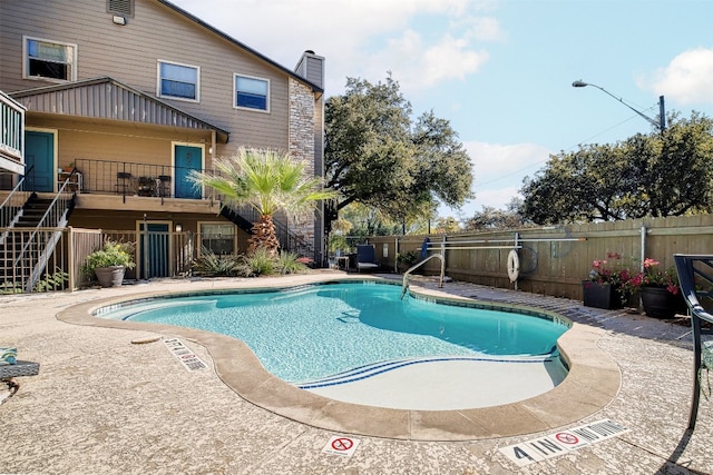 view of pool featuring a patio area