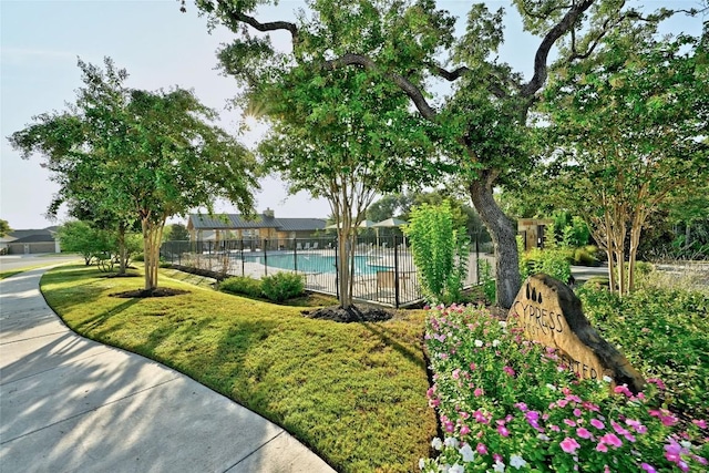 view of community with a swimming pool