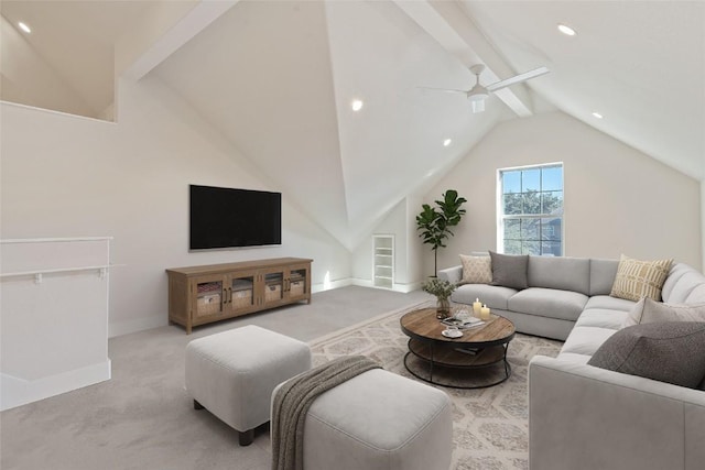 carpeted living room featuring vaulted ceiling with beams, a ceiling fan, and baseboards