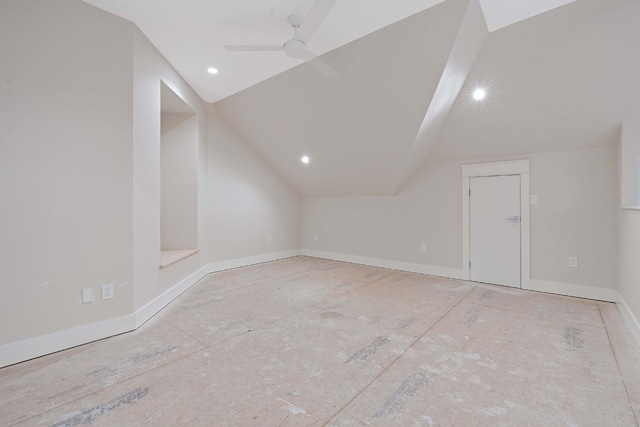 additional living space featuring vaulted ceiling and ceiling fan