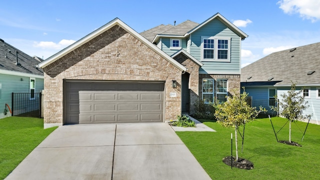 craftsman-style home featuring a front yard and a garage