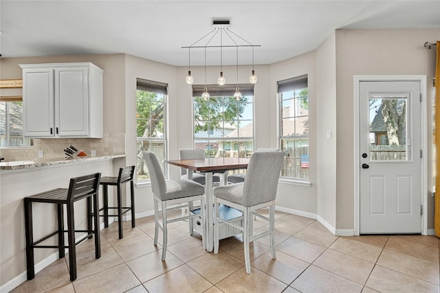 view of tiled dining space