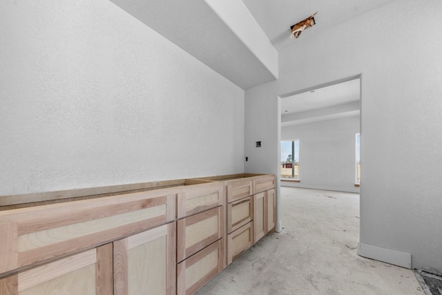 bathroom with concrete floors