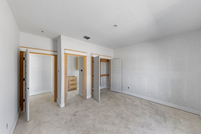 unfurnished bedroom with a closet