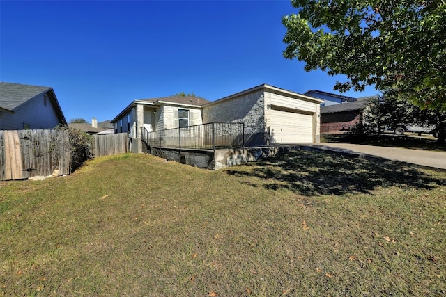 view of property exterior with a lawn and a garage