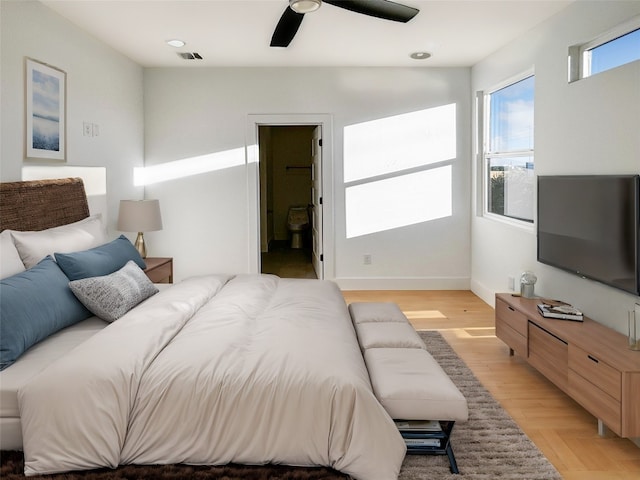 bedroom featuring ceiling fan and light hardwood / wood-style floors