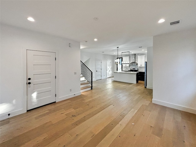 entryway featuring light hardwood / wood-style floors