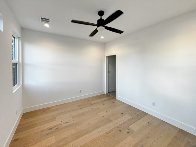 unfurnished room featuring ceiling fan and light hardwood / wood-style flooring