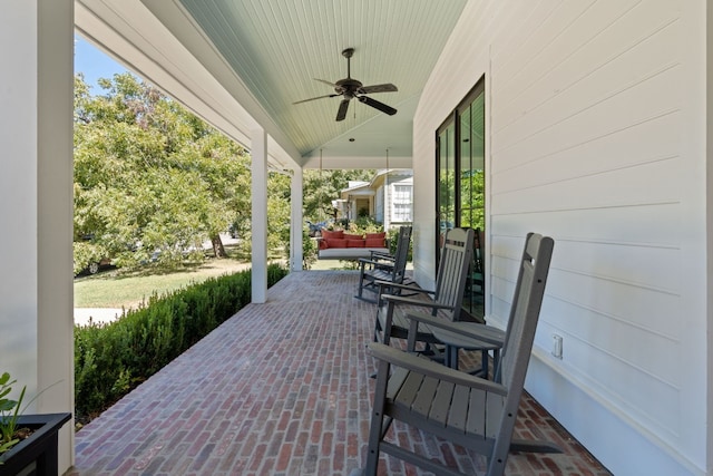 view of patio / terrace featuring a porch and ceiling fan