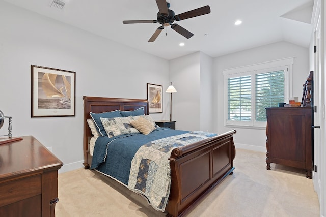 bedroom featuring lofted ceiling, light carpet, and ceiling fan