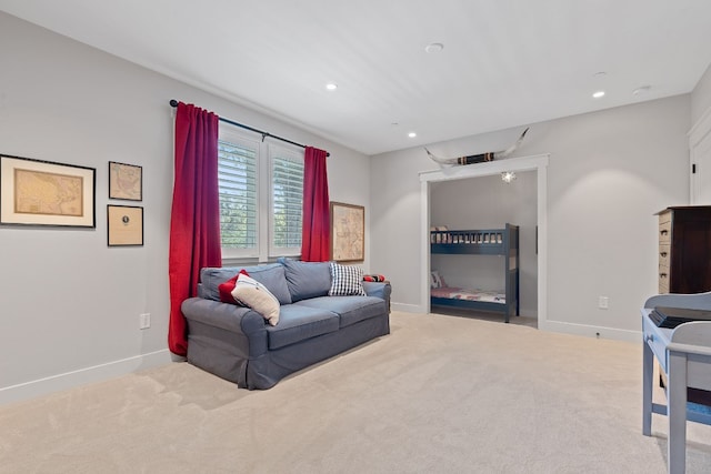 living room with light colored carpet