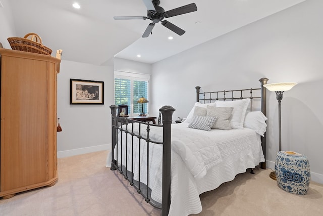 bedroom with light carpet and ceiling fan