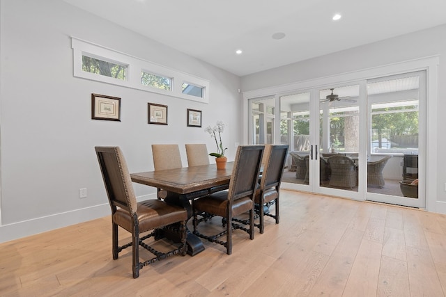 dining area featuring light wood-type flooring