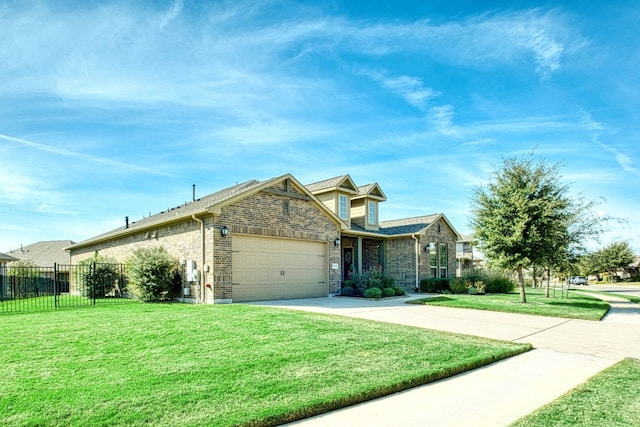 view of front of home featuring a garage and a front lawn