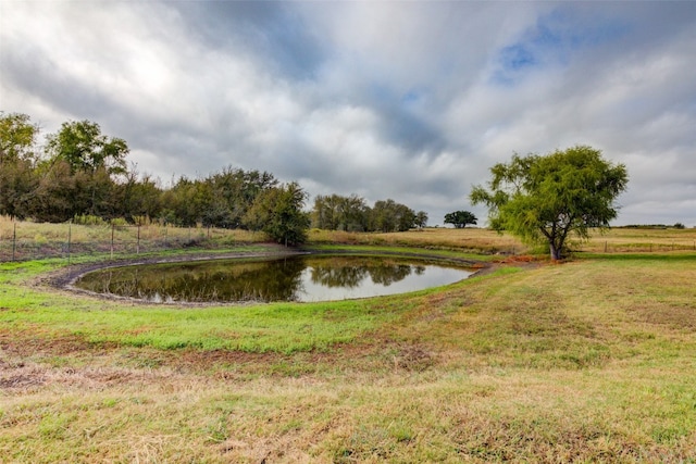 surrounding community with a water view