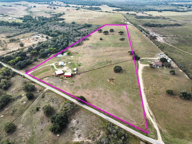 birds eye view of property featuring a rural view