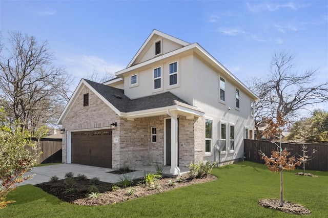 view of front facade with a garage and a front yard