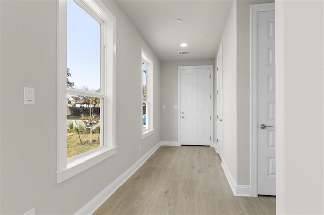 hall featuring light wood-type flooring