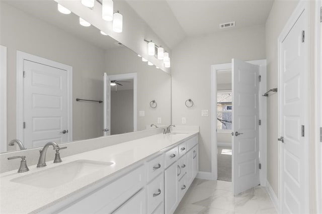 bathroom featuring vanity and ceiling fan