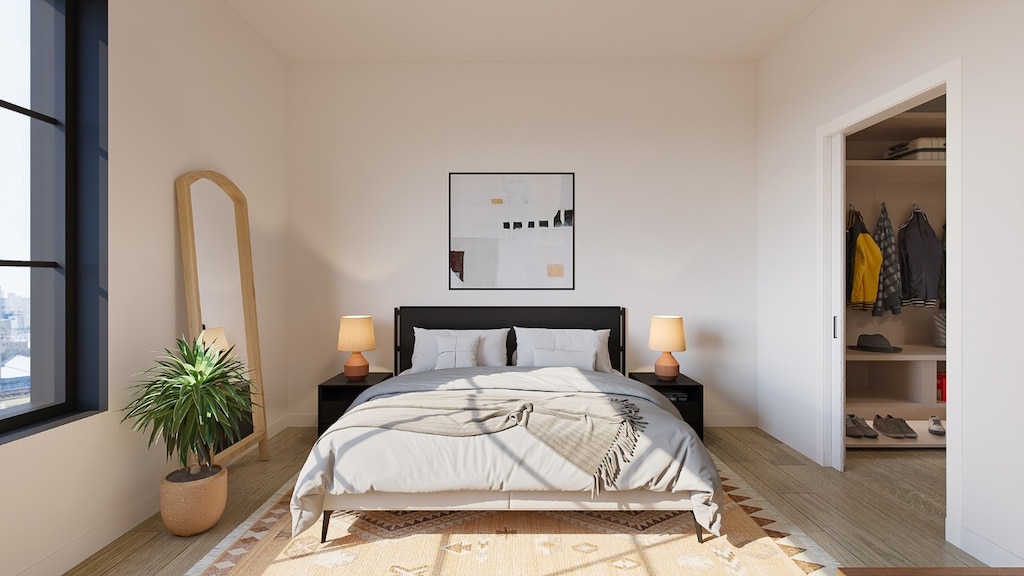 bedroom featuring light hardwood / wood-style floors