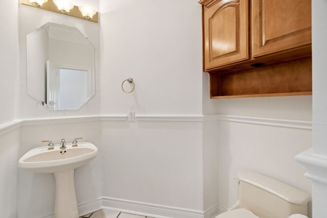 3600 Sawmill Dr, Austin, TX 78749 - half bath featuring toilet and tile patterned floors