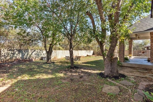 3600 Sawmill Dr, Austin, TX 78749 - fenced backyard with a ceiling fan and a patio