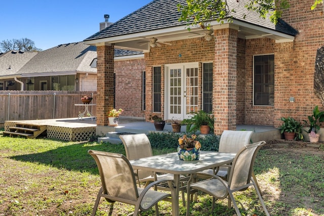 3600 Sawmill Dr, Austin, TX 78749 - view of patio / terrace with a wooden deck, french doors, outdoor dining space, and a ceiling fan
